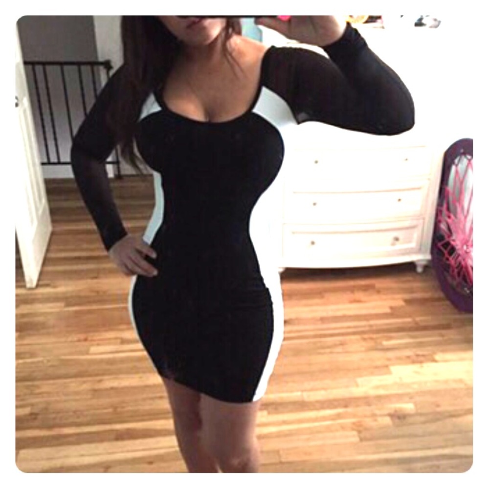 Sexy mini black & white symphony dress.